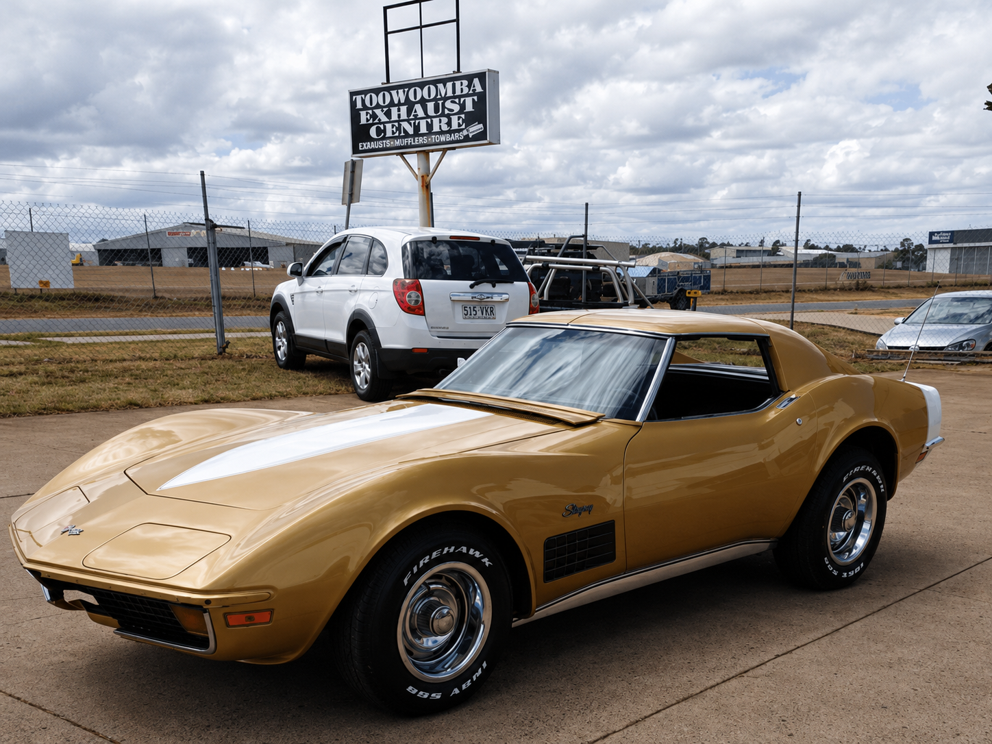 Gold classic Corvette outside Toowoomba Exhaust Centre